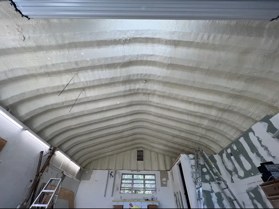 Spray polyurethane foam applied to the underside of a metal roof deck in Ocean City